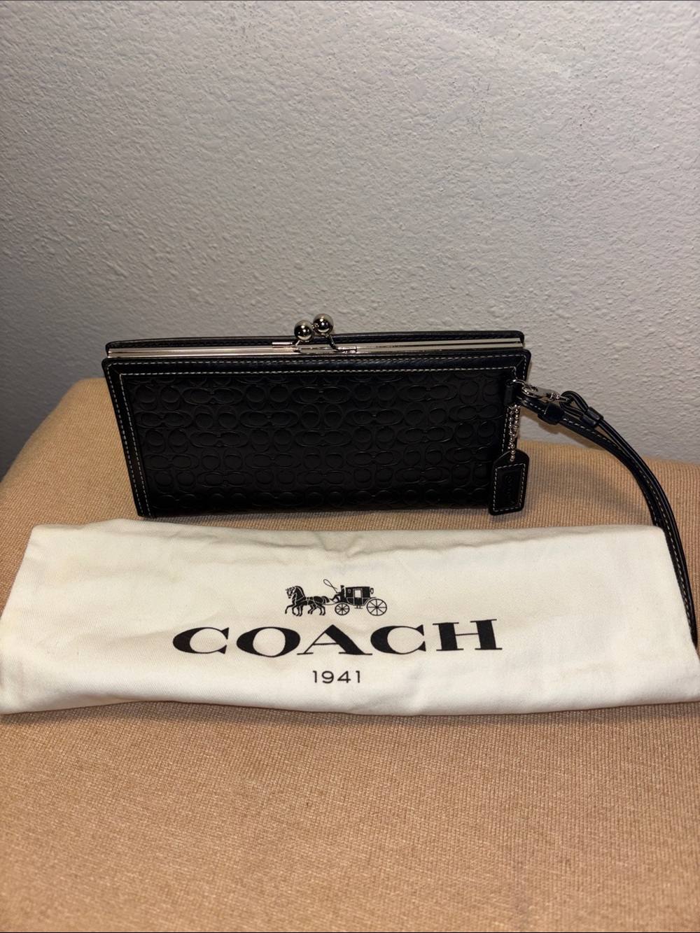 Coach Black Y2K Signature
Mini C Embossed Kisslock
Framed Wristlet Wallet